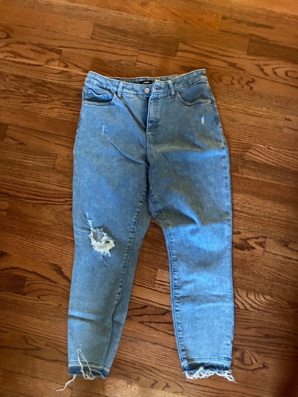 Express Women's Skinny Jeans in Light Blue Distressed